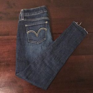 Levi’s unhemmed ankle length jeans